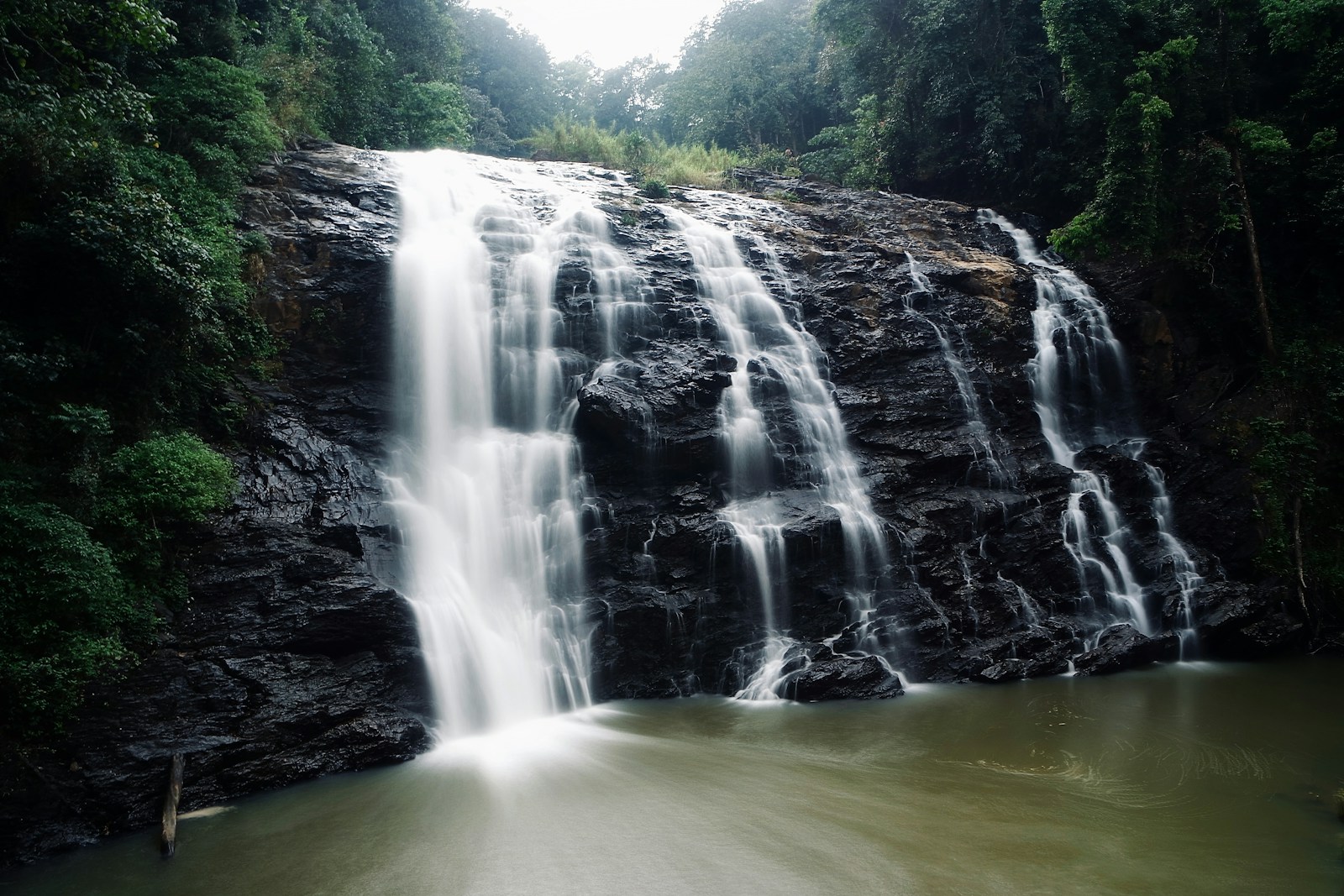 https://www.holidaypartner.in/wp-content/uploads/sites/1/2025/11/waterfall-coorg.jpg